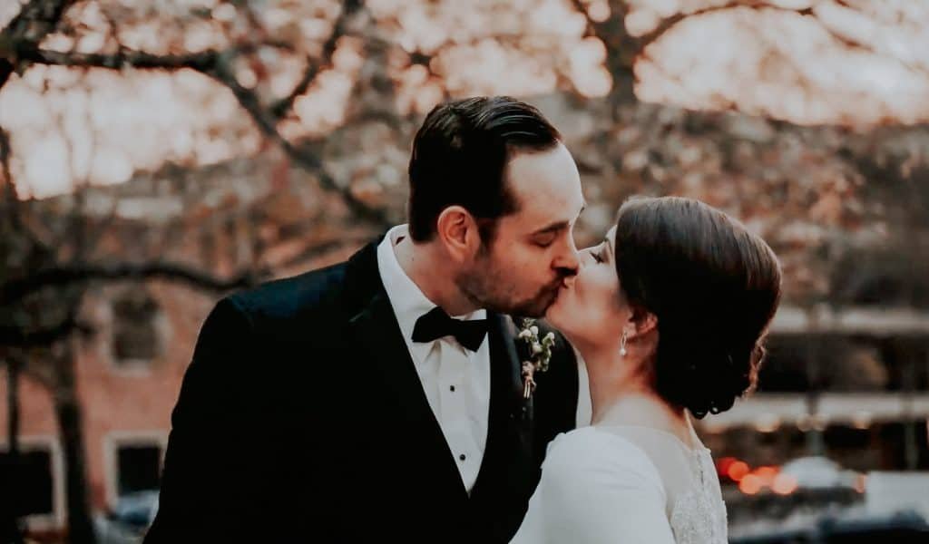 bride and groom kissing in Little Rock