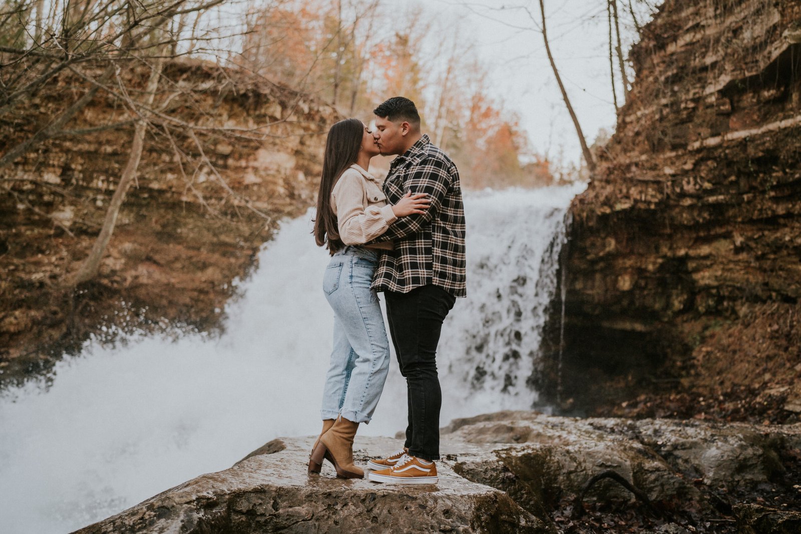 engagement session in front of waterfall in Tanyard creek in Bellavista Arkansas