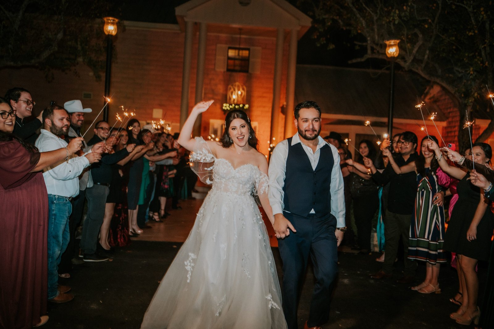 Bride and groom sparkler exit in the San Benito Texas by Haziel Photo & Films