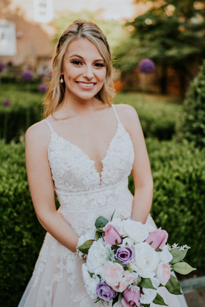 Detail of a bride's lace wedding gown during her Northwest Arkansas bridal session