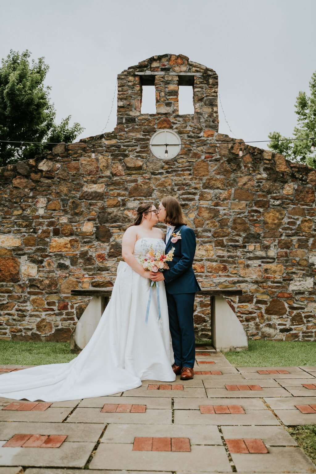 Couple at the chapel ruins at Sassafras Springs Vineyard in Springdale, Arkansas