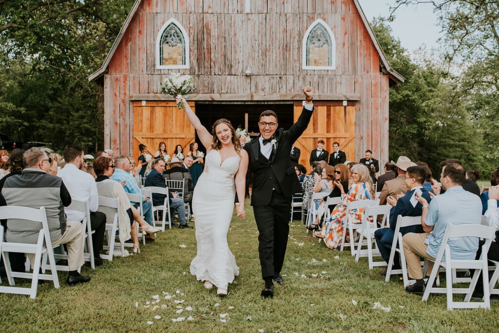 Kaylee and Jonathan at their Holland Barn wedding in Highfill, Arkansas