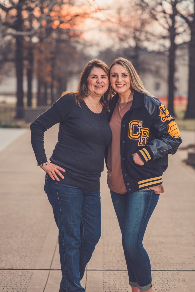 Senior girl in her letterman jacket with her mom, parent photos at a senior session in NWA