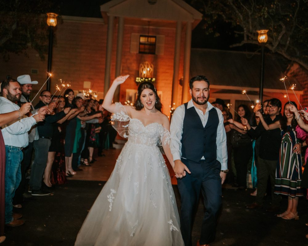 Bride and groom sparkler exit in the San Benito Texas by Haziel Photo & Films