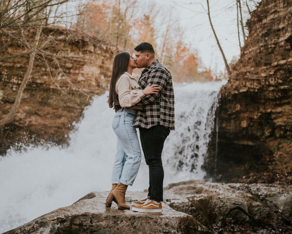 engagement session in front of waterfall in Tanyard creek in Bellavista Arkansas